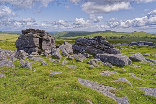 Stones and landscape at the top Tor tor rock hill in Dartmoor National Park. Widecombe-in-the-Moor, Bovey Tracey, Devon, South England, Great Britain