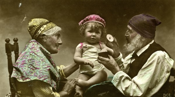 Grandma and grandpa with grandson, 1910, A baby is lovingly held by his grandparents, surrounded by a feeling of warmth, Historical photo