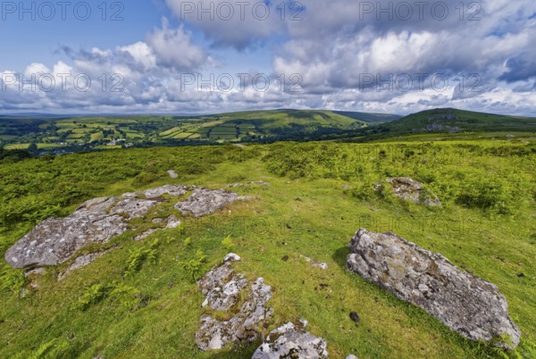 Stones and landscape at the top Tor tor rock hill in Dartmoor National Park. Widecombe-in-the-Moor, Bovey Tracey, Devon, South England, Great Britain