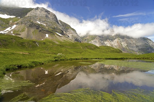 Lake in the Cirque de Troumouse basin in the Pyrenees National Park near Gavarnie-Gèdre, France