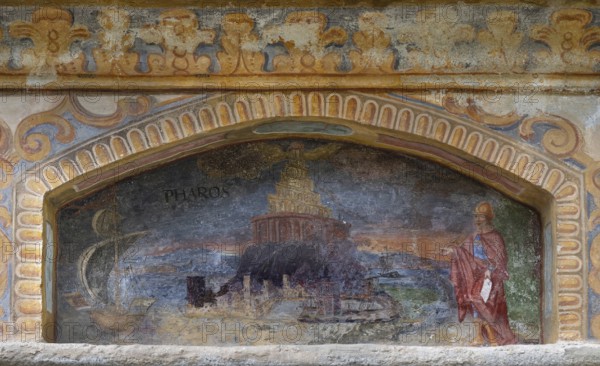 Fresco of the wonder of the world Alexandria, lighthouse on the island of Pharos at the fountain of wonders, 1508, in the courtyard of Neustift St Margarethen monastery, Vahrn, district of Bolzano, South Tyrol, Italy