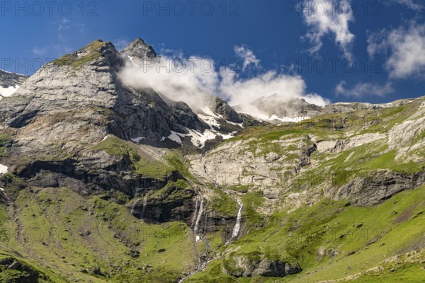 Waterfall at the Cirque de Troumouse basin in the Pyrenees National Park near Gavarnie-Gèdre, France
