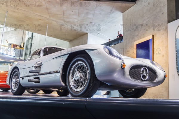 Mercedes-Benz 300 SLR Uhlenhaut Coupé from 1955. Two examples were built, one was auctioned. With proceeds of 135 million euros, it is the most valuable car in the world. The Mercedes-Benz Museum in Stuttgart presents a journey through the automotive history of the global corporation. The history of the Mercedes star begins with the first automobile in 1886. 160 vehicles are on display. Stuttgart, Baden-Württemberg, Germany