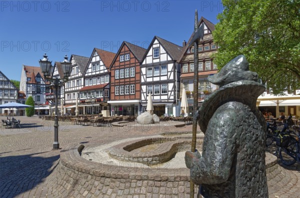 The statue of the night watchman on the market square in the historic old town of Rinteln. Lower Saxony, Germany