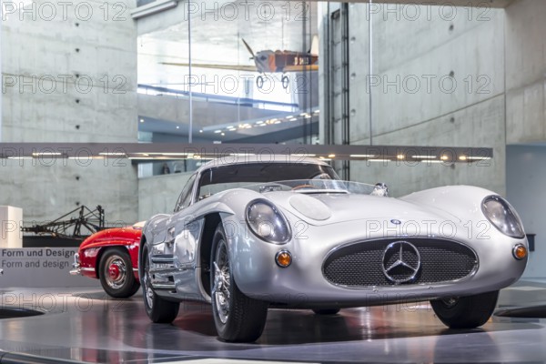 Mercedes-Benz 300 SLR Uhlenhaut Coupé from 1955. Two examples were built, one was auctioned. With proceeds of 135 million euros, it is the most valuable car in the world. The Mercedes-Benz Museum in Stuttgart presents a journey through the automotive history of the global corporation. The history of the Mercedes star begins with the first automobile in 1886. 160 vehicles are on display. Stuttgart, Baden-Württemberg, Germany