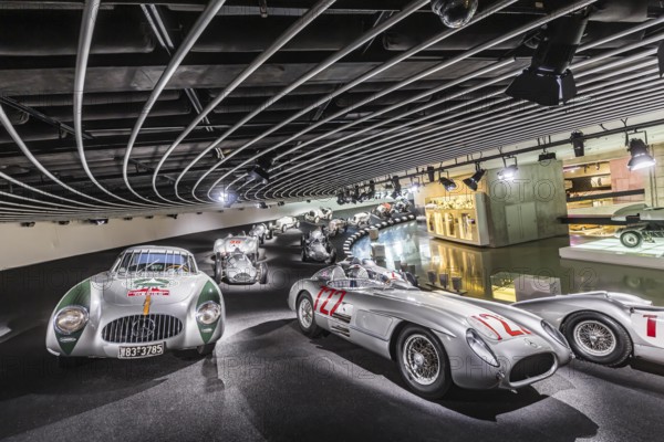 The Mercedes-Benz Museum in Stuttgart presents a journey through the automotive history of the global corporation. Myth 7: Racing cars and Silver Arrows - races and records. The history of the Mercedes star begins with the first automobile in 1886. Stuttgart, Baden-Württemberg, Germany