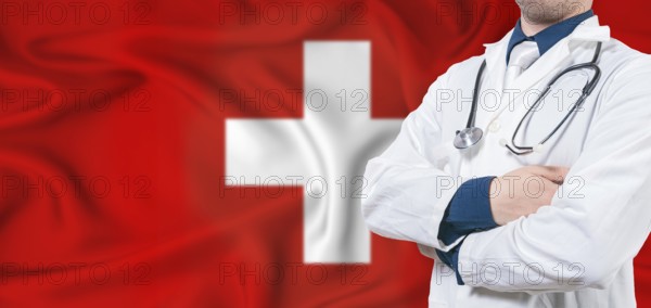 Switzerland healthcare concept. Male doctor on Switzerland flag. Doctor with crossed arms on Switzerland flag
