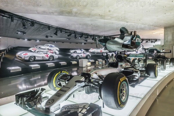 The Mercedes-Benz Museum in Stuttgart presents a journey through the automotive history of the global corporation. Myth 7: Racing cars and Silver Arrows - races and records. The history of the Mercedes star begins with the first automobile in 1886. Stuttgart, Baden-Württemberg, Germany