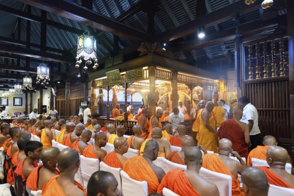 Monks in a prayer session, Temple of the sacred Tooth Relic or Sri Dalada Maligawa, Kandy, Sri Lanka