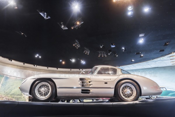 Mercedes-Benz 300 SLR Uhlenhaut Coupé from 1955. Two examples were built, one was auctioned. With proceeds of 135 million euros, it is the most valuable car in the world. The Mercedes-Benz Museum in Stuttgart presents a journey through the automotive history of the global corporation. The history of the Mercedes star begins with the first automobile in 1886. 160 vehicles are on display. Stuttgart, Baden-Württemberg, Germany