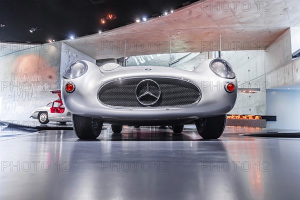 Mercedes-Benz 300 SLR Uhlenhaut Coupé from 1955. Two examples were built, one was auctioned. With proceeds of 135 million euros, it is the most valuable car in the world. The Mercedes-Benz Museum in Stuttgart presents a journey through the automotive history of the global corporation. The history of the Mercedes star begins with the first automobile in 1886. 160 vehicles are on display. Stuttgart, Baden-Württemberg, Germany