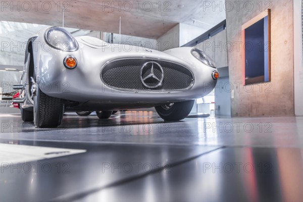 Mercedes-Benz 300 SLR Uhlenhaut Coupé from 1955. Two examples were built, one was auctioned. With proceeds of 135 million euros, it is the most valuable car in the world. The Mercedes-Benz Museum in Stuttgart presents a journey through the automotive history of the global corporation. The history of the Mercedes star begins with the first automobile in 1886. 160 vehicles are on display. Stuttgart, Baden-Württemberg, Germany