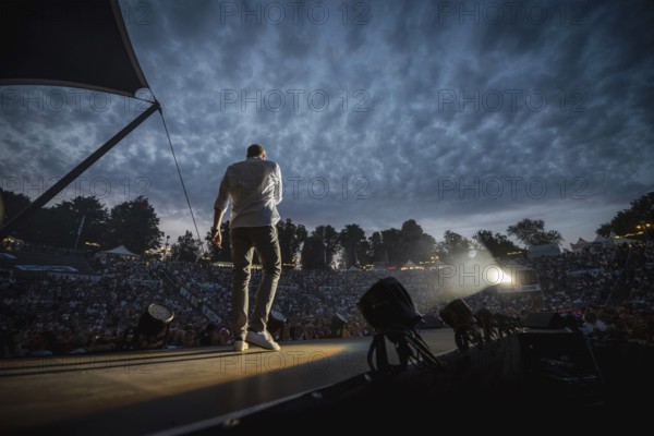 Sebastian Oswald, one of the presenters at the Berliner Rundfunk 91.4 Open Air at the Berlin Parkbühne Wuhlheide on 5 July 2025