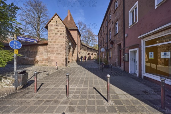 Old town, city fortification, city wall, buildings, trees, bollards, blue sky, Spittlertor wall, Nuremberg, Middle Franconia, independent city, Bavaria, Germany
