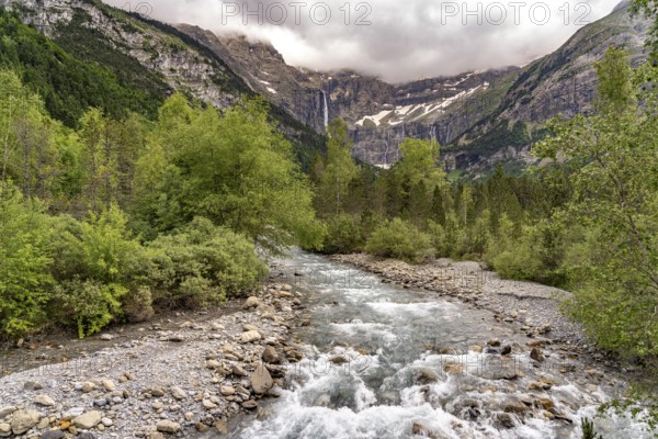 The Gave de Gavarnie river in the Cirque de Gavarnie basin, UNESCO World Heritage Site in the Pyrenees National Park near Gavarnie-Gèdre, France