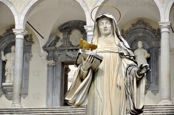 Marble statue of St Scholastica of Nursia by sculptor P. Campi of Carrara, Bramante Cloister, Benedictine Abbey of Montecassino, Monte Cassino, Cassino, Frosinone, Lazio, Italy