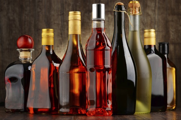 Composition with bottles of assorted alcoholic beverages