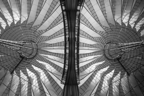 Roof of the Sony Center. Sony Centre is an eye-catching monolith of glass and steel featuring an enormous tent-like conical roof, its shape reportedly inspired by Mount Fuji in Japan, covering an elliptical central public space up to 102 metres acros