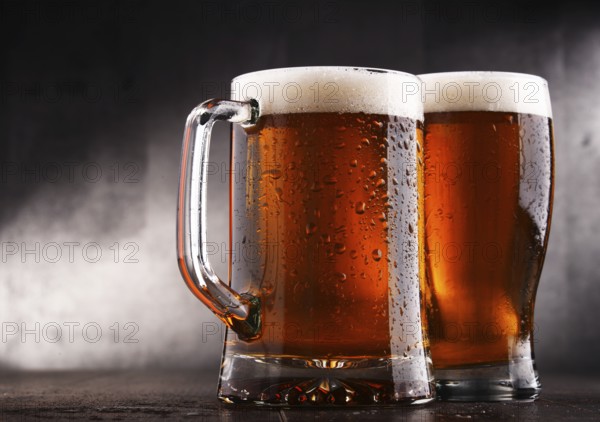 Composition with two glasses of beer