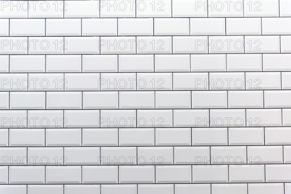Background from a white tile wall