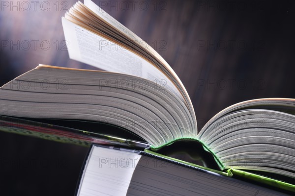 Composition with open book on the table