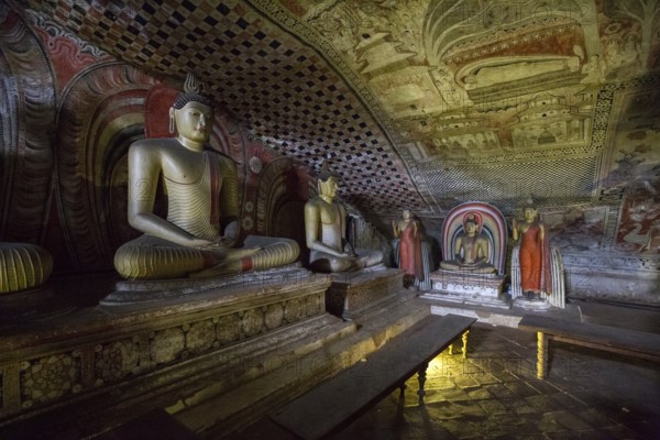 Dambulla, Sri Lanka, August 15, 2018: Buddha statues inside the historical Dambulla Cave Temple