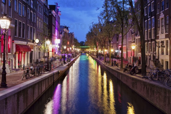Amsterdam Red Light District by night in the old part of the city, North Holland, the Netherlands