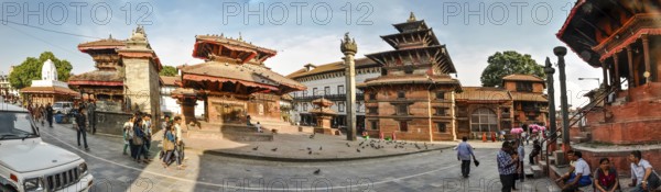 Kathmandu, Nepal, circa June 2012: Photo of old buildings and people at Durbar Square in Kathmandu, Nepal. Durbar square belongs to UNESCO World Heritage Sites. Documentary editorial