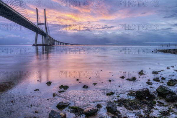 The Vasco da Gama Bridge over the River Tagus in Lisbon, Portugal, at sunrise