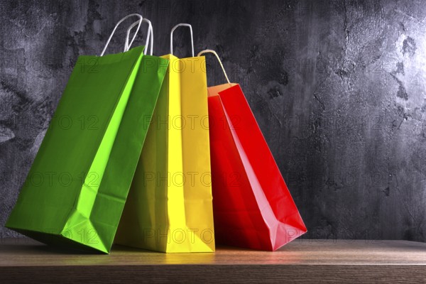Composition with colorful paper shopping bags