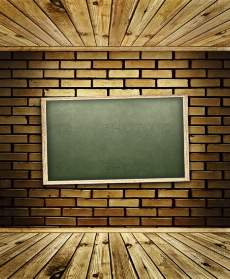 School blackboard at brick wall