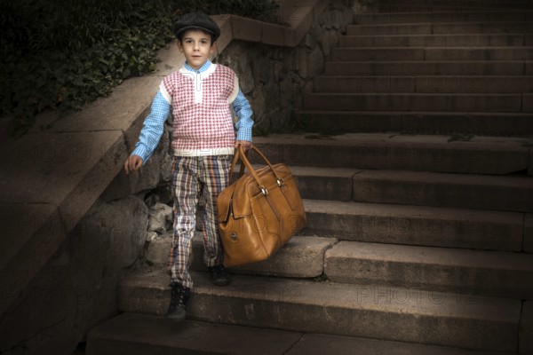 Exterior stairs and child with vintage bag. Vintage clothes style