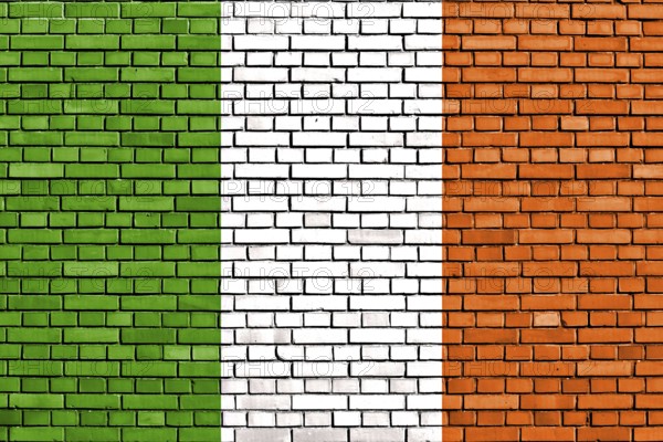 Flag of Ireland painted on brick wall