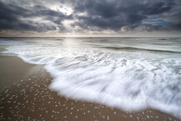 North sea waves on sand beach, Zandvoort, Netherlands