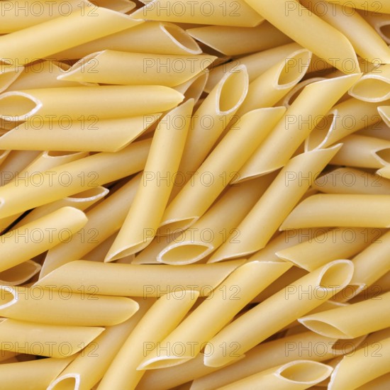 Penne lisce macaroni, italian pasta background