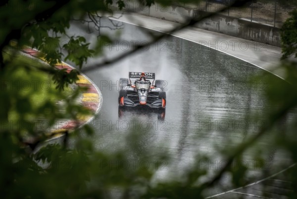 SANTINO FERRUCCI (14) of Woodbury, Connecticut comes through turn 12 (Canada Corner) during a wet practice session for the XPEL Grand Prix at Road America in Elkhart Lake, WI