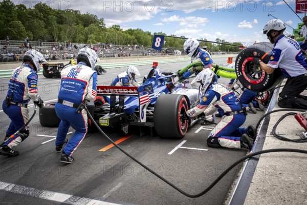 LINUS LUNDQVIST (R) (8) of Stockholm, Sweden comes down pit road for service during the XPEL Grand Prix at Road America in Elkhart Lake, WI