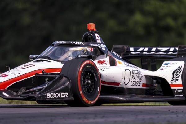 TOBY SOWERY (R) (51) of Cambridge, England practices for the Honda Indy 200 at Mid-Ohio Sports Car Course in Lexington, OH