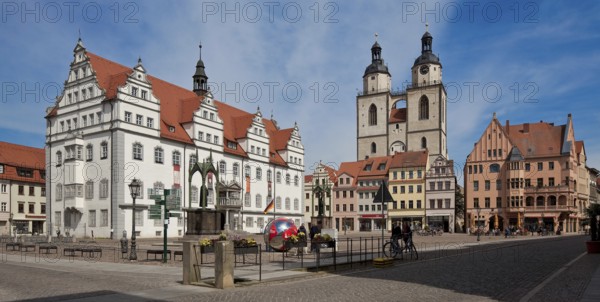 Wittenberg Market Square 79619 Town Hall 16th century by Sebastian Krüger Town Church 14-16th century in front Melanchthon Monument by Johann Heinrich Strack Luther Monument by Gottfried Schadow both 19th century