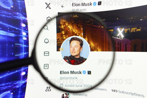 April 17, 2024, Brazil. In this photo illustration, the Elon Musk's official profile, on the social network X (Twitter) logo seen displayed on a computer screen through a magnifying glass