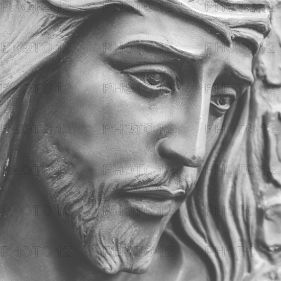 Statue of the face of jesus with a crown of thorns. Close-up. Ideal for concepts or events like Easter