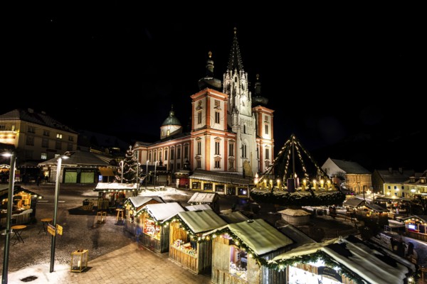 Christmas market in front of the basilica of Mariazell, night shot, main square, Mariazell, Upper Styria, Styria, Austria