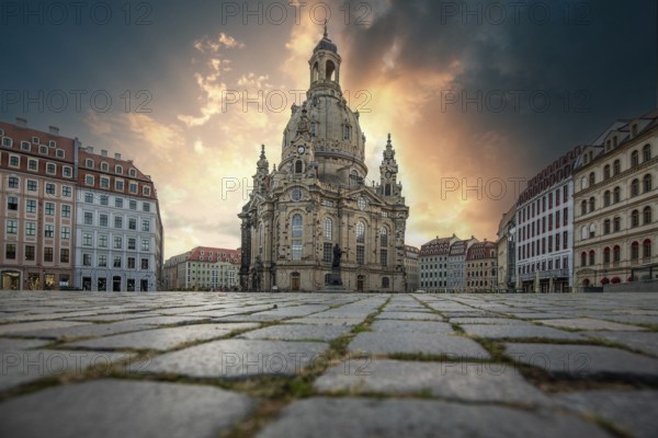 The Church of Our Lady is a baroque Protestant-Lutheran church and the defining monumental building of the Neumarkt. Romantic sunrise in the historic city centre of Dresden, Saxony, Germany