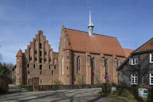 Wienhausen b Celle former Cistercian monastery 93921 left west wing of the monastery right monastery church and inn view from south