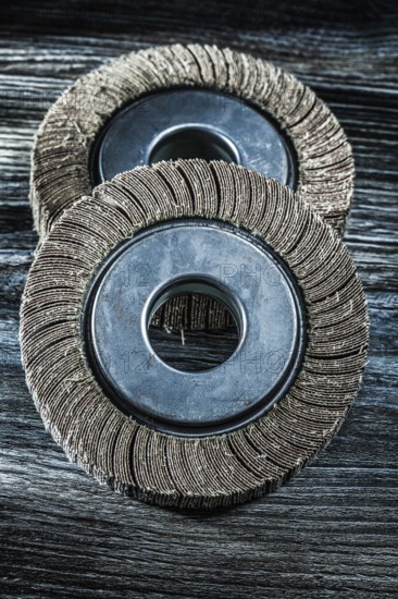 Used grinding wheels on vintage wooden board