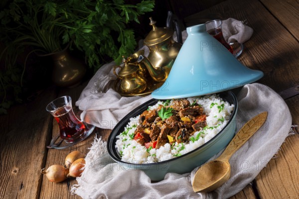 Tajin beef stew with rice, peppers and sesame seeds