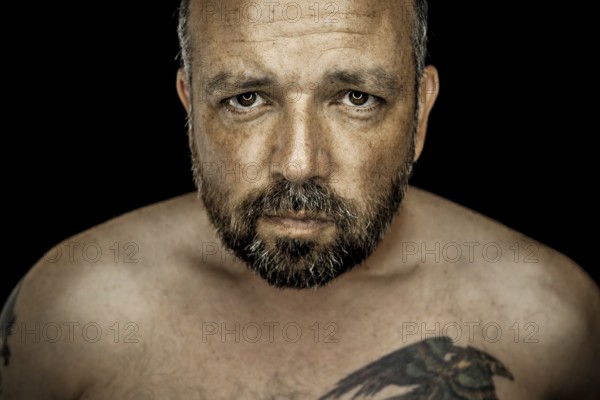An image of a handsome man with a beard