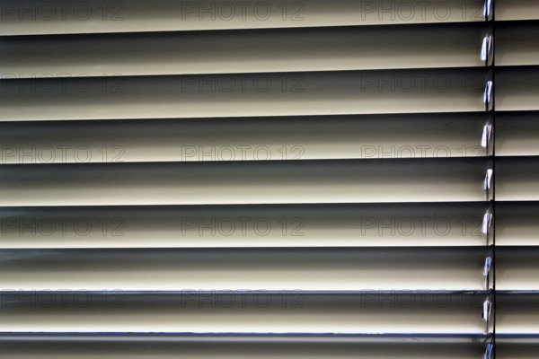 Blinds are fitted to a window to protect against heat and sun. Austria