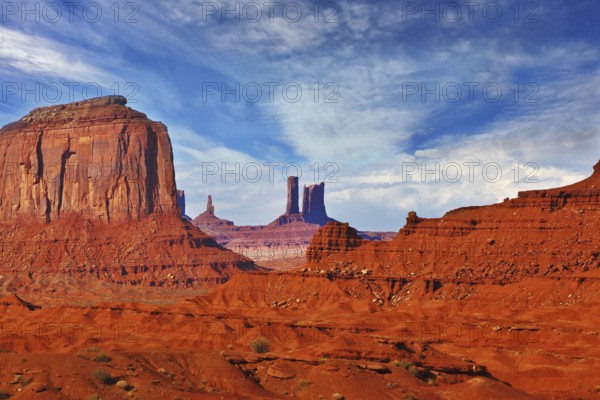 Magic view of the red desert. Monument Valley in the Navajo Indian Reservation. Arizona, USA. The unique red sandstone buttes mitts