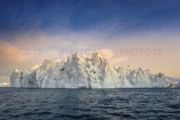 Floating glaciers in the rays of the setting sun during a polar night